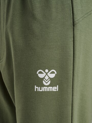 Hummel Tapered Sports trousers in Green