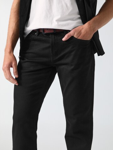 GUESS Regular Jeans in Schwarz