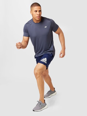 new balance - Camiseta funcional 'Accelerate' en azul