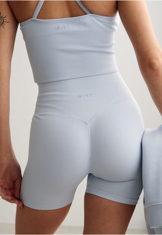 Skinny Pantaloni sportivi di Aim'n in grigio