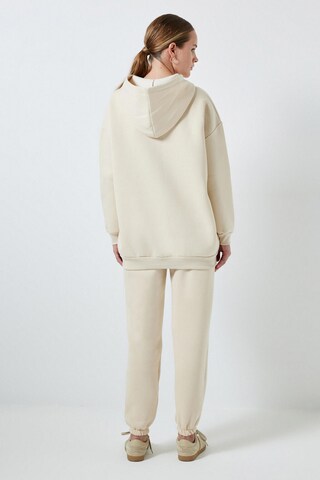 Touche Prive Joggingpak in Beige