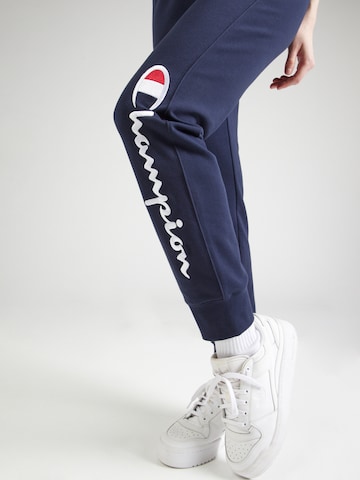Tapered Pantaloni di Champion Authentic Athletic Apparel in blu