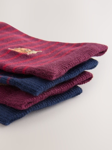 Next Sockor i blå
