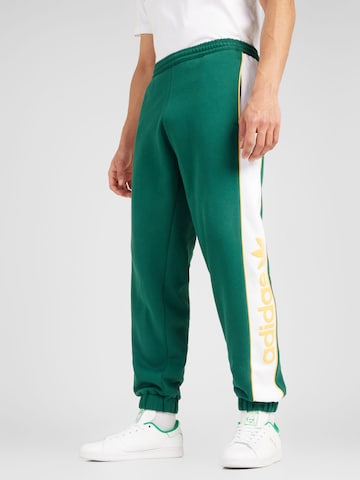 Tapered Pantaloni de la ADIDAS ORIGINALS pe verde: față