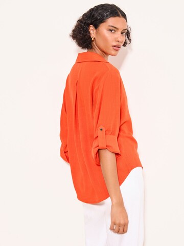 Lipsy - Blusa en naranja