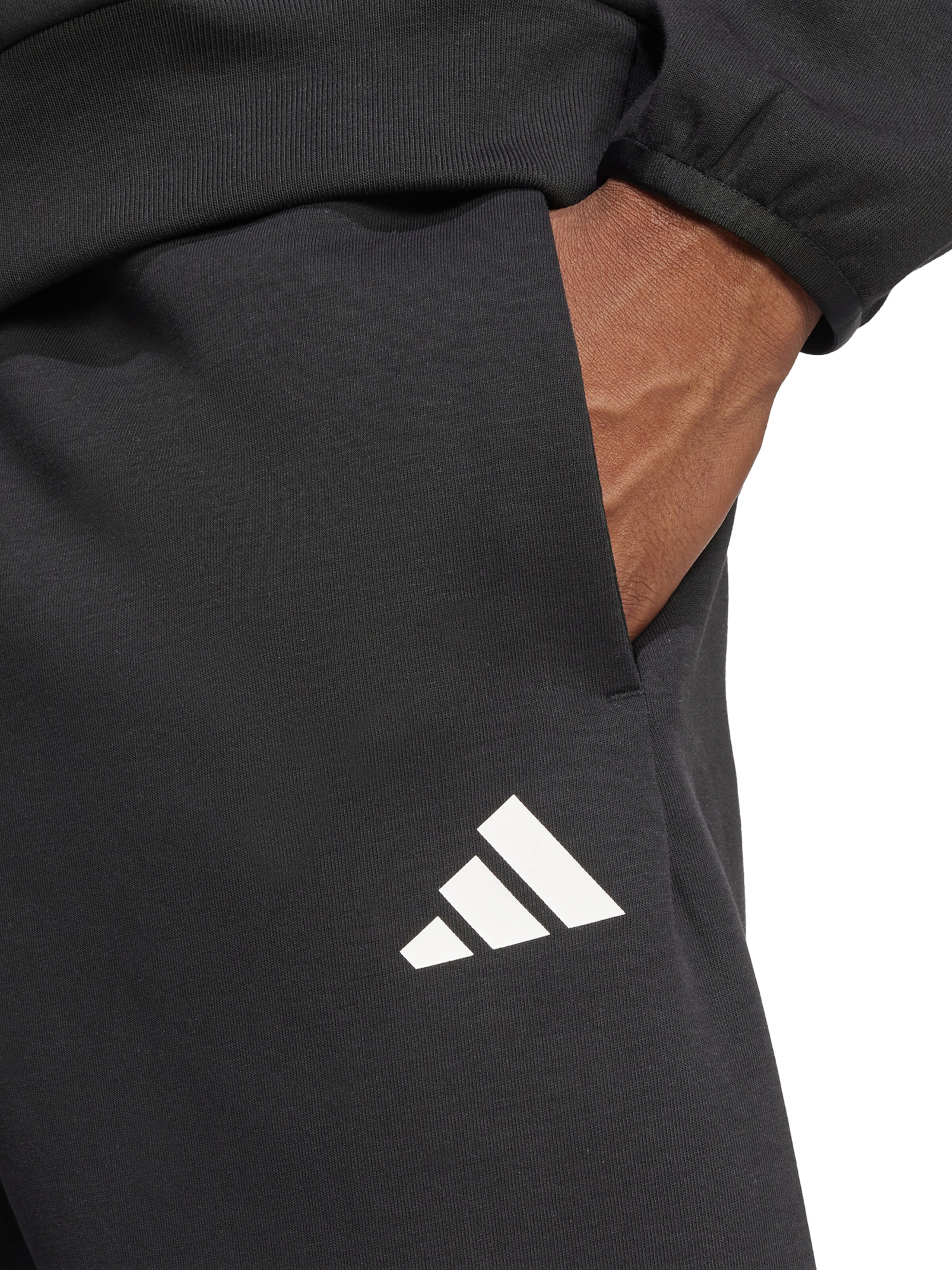 Tapered Pantaloni sport de la ADIDAS SPORTSWEAR pe negru