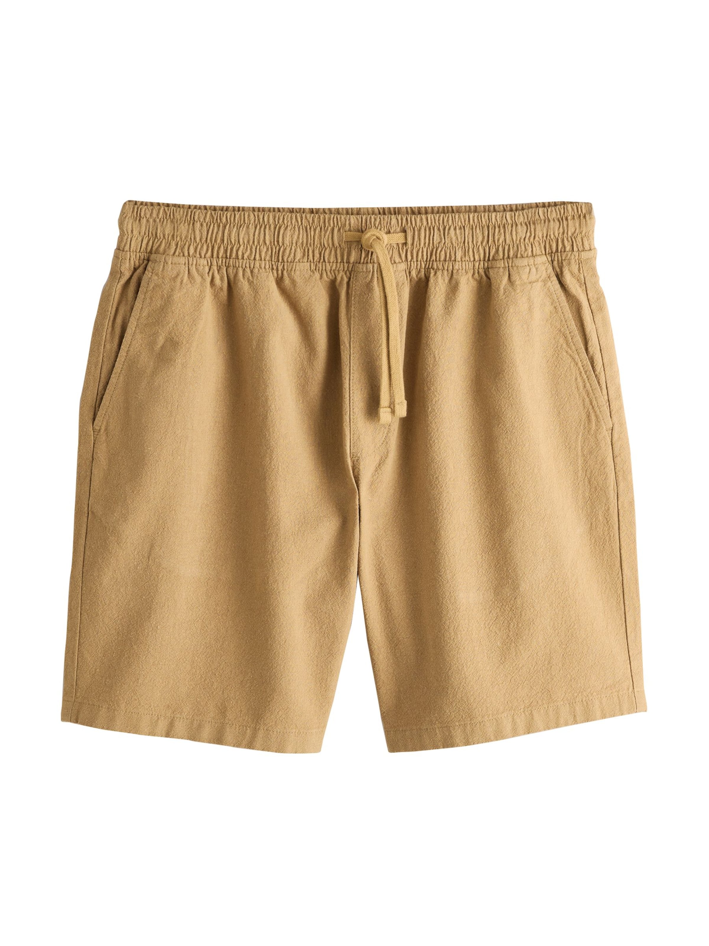 Next - Calças em castanho: frente