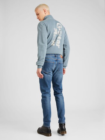 DIESEL Slimfit Jeans 'STRUKT' in Blauw