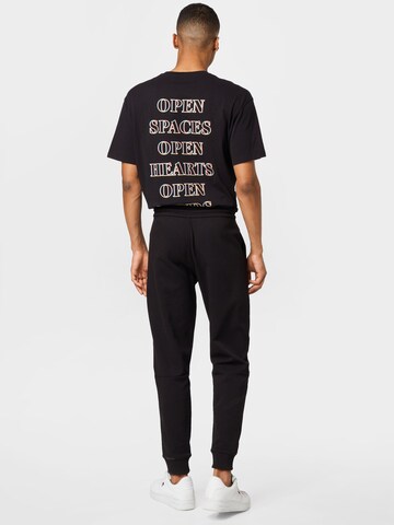 Calvin Klein Дънки Tapered Leg Панталон в черно