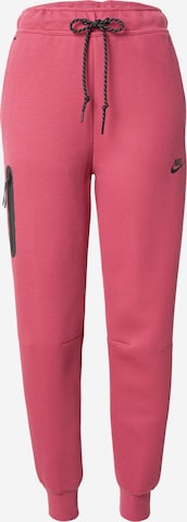 Nike SportswearTapered Hlače 'TCH FLC' - roza boja: prednji dio