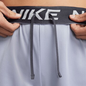 NIKE Regular Workout Pants in Blue