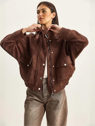 Bianco Lucci Tussenjas in Bruin