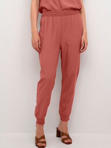 Cream Tapered Trousers in Red