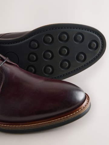 Next - Botines chukka en rojo