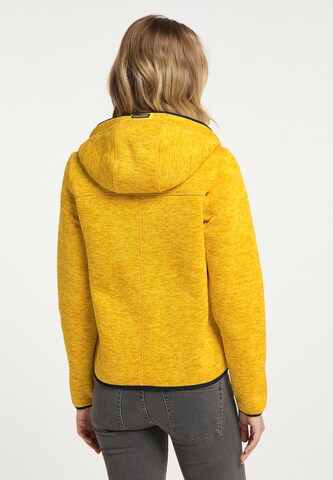 Manteau fonctionnel Schmuddelwedda en jaune