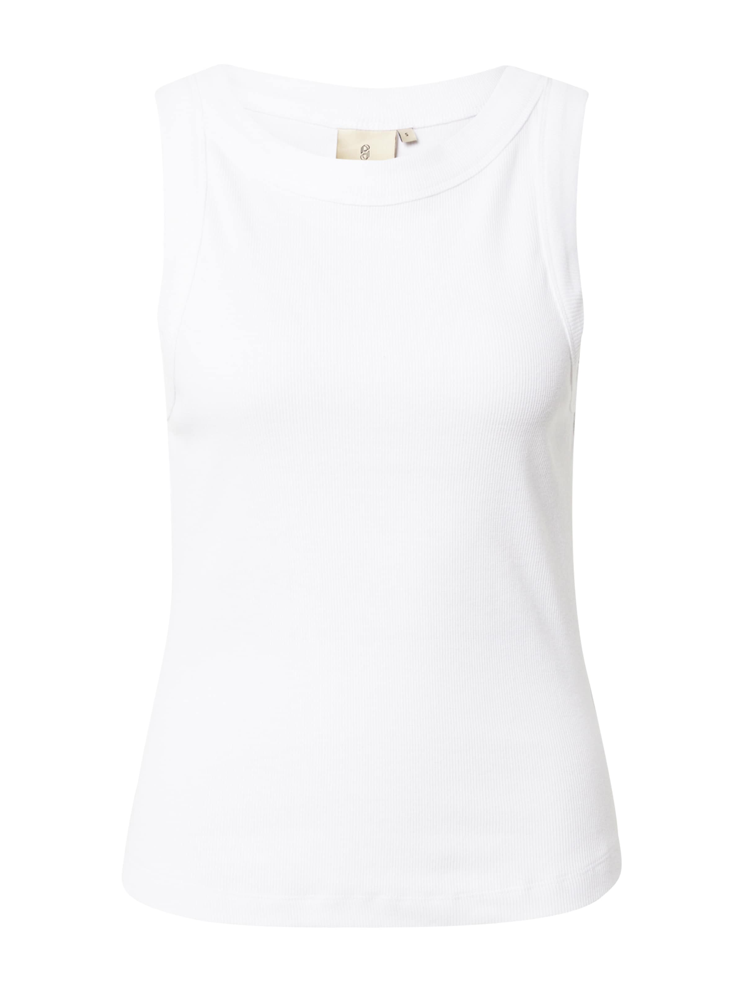 balts Peppercorn Topiņš 'Dharma': no priekšpuses