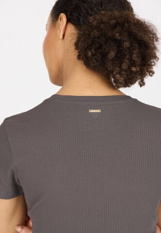 Athlecia Functioneel shirt 'Lankae' in Bruin