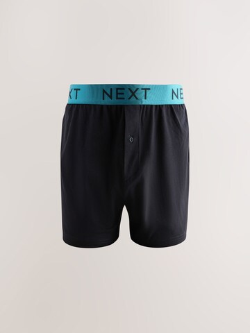 Boxeri de la Next pe negru