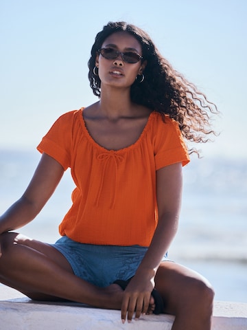 T-shirt Next en orange : devant