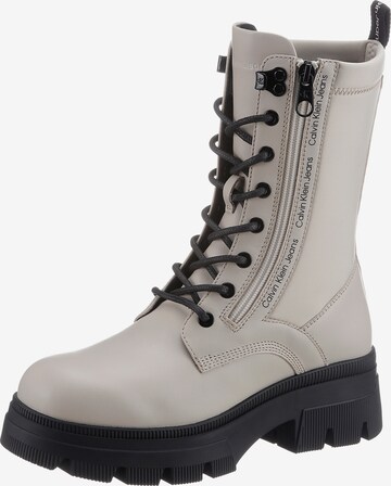 Calvin Klein Jeans Lace-Up Ankle Boots in Beige: front