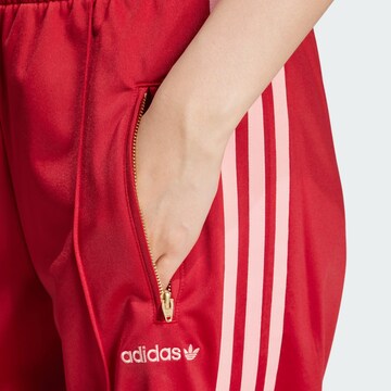 ADIDAS ORIGINALS Loose fit Trousers 'Firebird' in Red