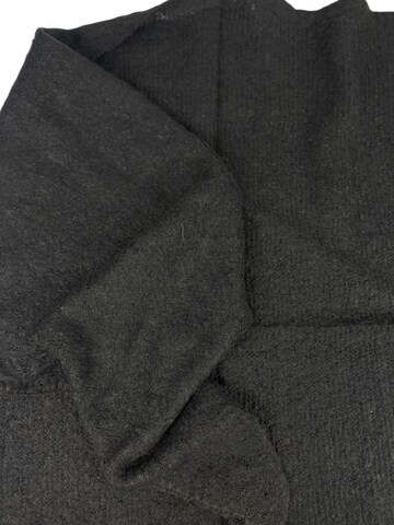 Kumixi Oversizeschal‌‌‌‌‌‌‌‌ in Schwarz