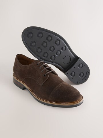 Next Veterschoen in Bruin