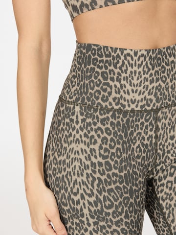 Skinny Pantaloni sportivi 'Windia' di Athlecia in beige