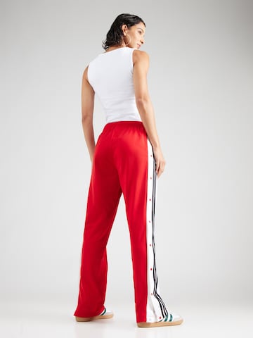 ADIDAS ORIGINALS Loose fit Trousers 'ADIBREAK' in Red