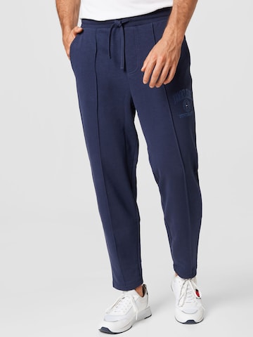Tommy Jeans Regular Pants 'Collegiate Baxte' in Blue: front
