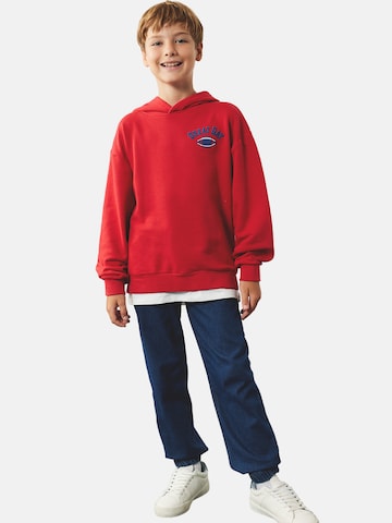 Koton Tapered Jeans in Blauw: voorkant