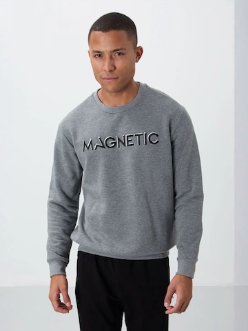 Sweat-shirt Tommy Life en gris : devant