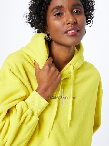 Calvin Klein Jeans Sweatshirt in Yellow