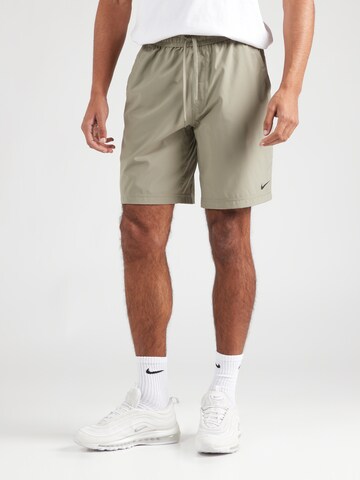 regular Pantaloni sportivi 'FORM 9IN' di NIKE in verde: frontale
