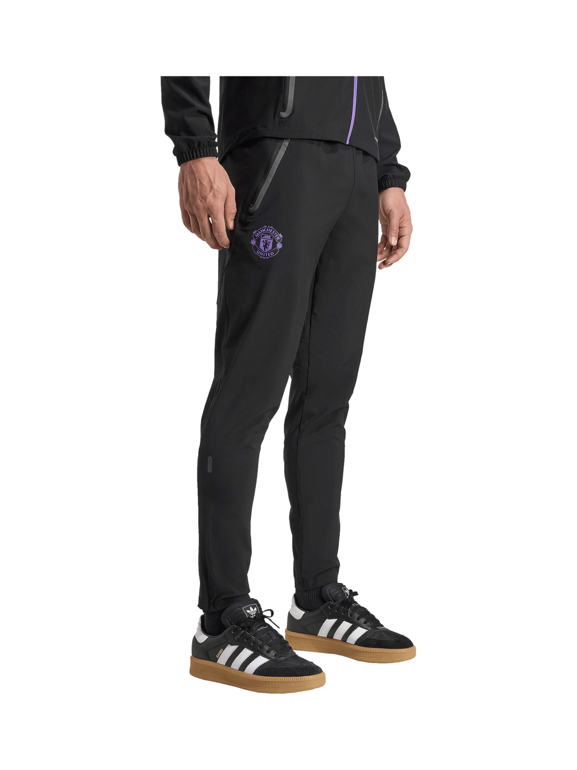 ADIDAS PERFORMANCE Tapered Urheiluhousut 'Manchester United Tiro 25' värissä musta