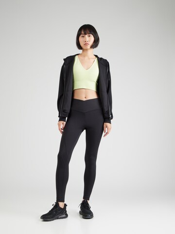 TRIUMPH Skinny Športne hlače 'Cardio' | črna barva