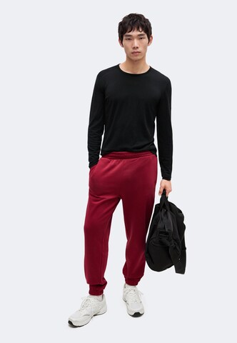 Tapered Pantaloni sport de la 4F pe roșu