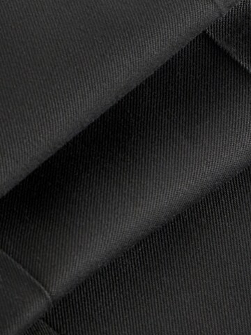 Loosefit Pantaloni chino di Next in nero