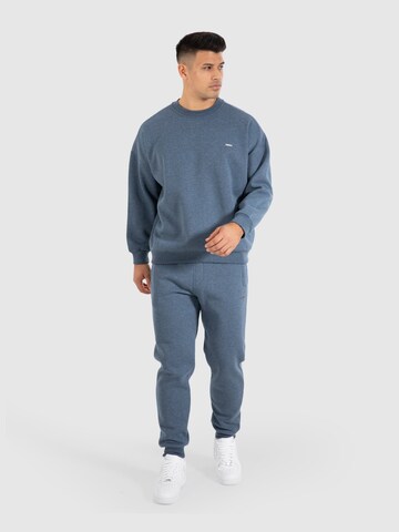 Sweat-shirt 'Kade' Smilodox en bleu