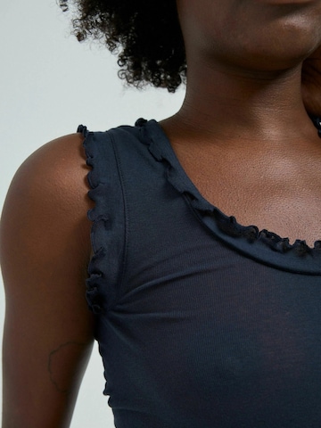 Seamless Basic Top 'Flounce' in Zwart