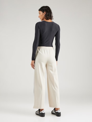 Marks & Spencer Zvonové kalhoty Kalhoty – béžová