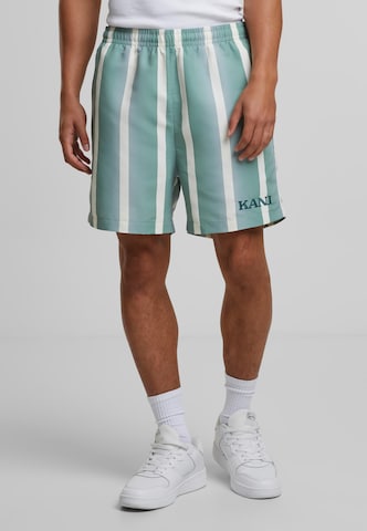 Loosefit Pantalon Karl Kani en vert : devant