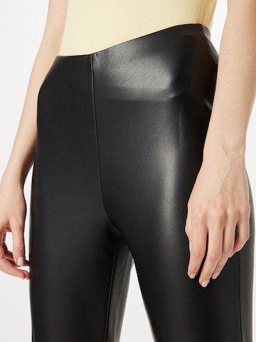 Coupe slim Leggings OUI en noir