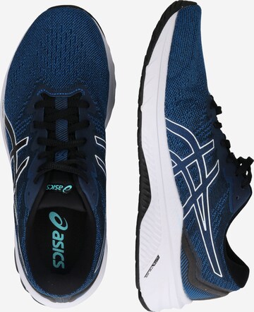 ASICS - Zapatillas de running en azul