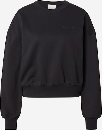 Sweat-shirt Calvin Klein en noir : devant