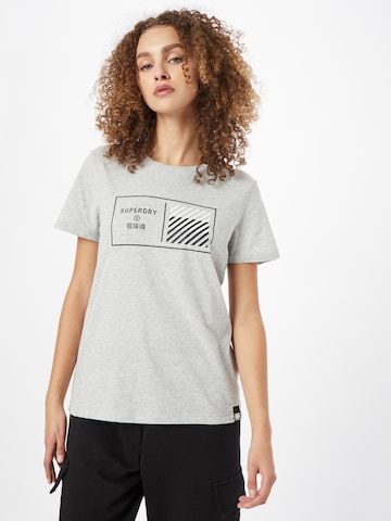 T-shirt fonctionnel 'Train Core' Superdry en gris : devant