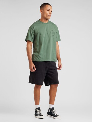 Carhartt WIP - Camiseta 'Stamp' en verde