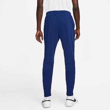 NIKE Tapered Sporthose in Blau