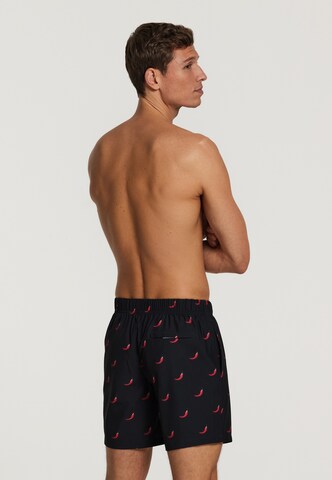 Shiwi - Bermudas 'chili pepper 4-way stretch' en negro