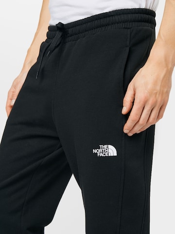 Slimfit Pantaloni di THE NORTH FACE in nero